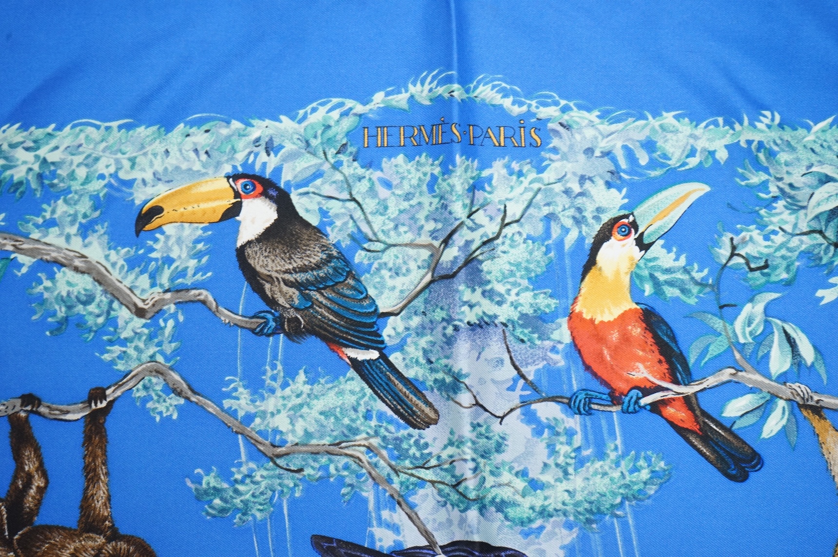 Two boxed Hermes silk scarves comprising ‘Real Escuela Andaluza del Arte Equestre’ and ‘Equateur’, with original boxes, together with four Hermes gentleman’s silk ties